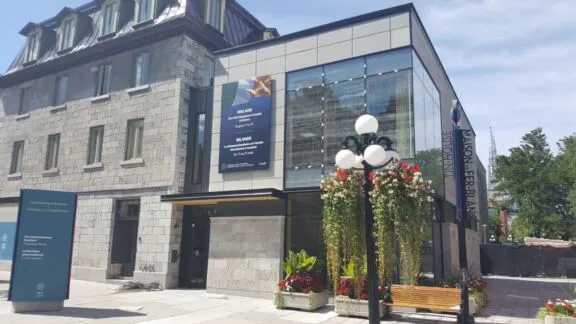 View of 7 Clarence Street, which features a bird-friendly glass design.