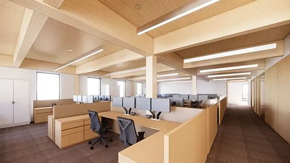 Rendering of the interior office space in the future administrative building, featuring an open-concept workspace with desks, workstations, and natural wood finishes.