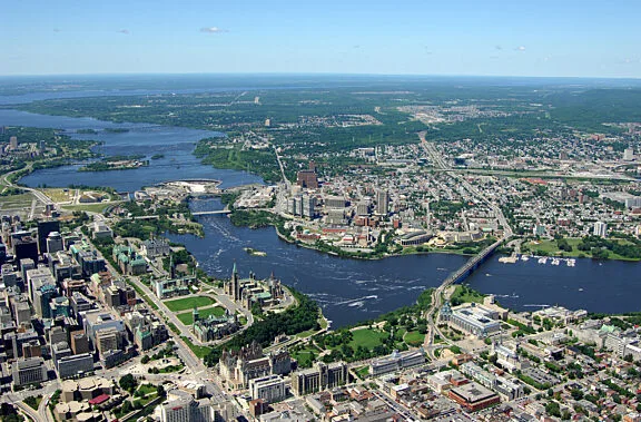 Aerial view of Ottawa, Gatineau and the Alexandra and Chaudière bridges crossing over the Ottawa River.