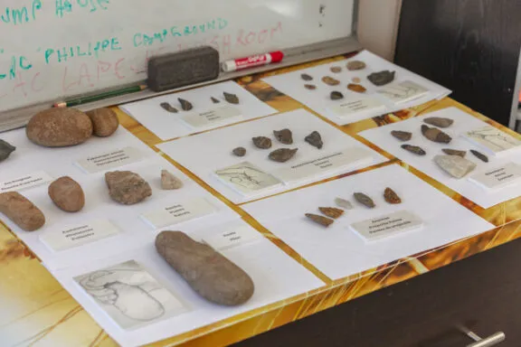 Artifacts grouped by category with labels and drawings illustrating how these artifacts were used in the past