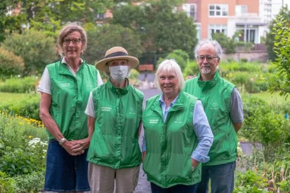 Portrait of four NCC volunteers at Maplelawn Garden