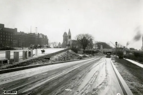 Road along the canal, leading under the Plaza Bridge. November 30, 1938. Credit: Library and Archives Canada / E999909216-u