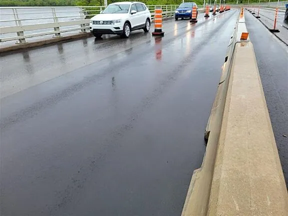 Paved road on bridge.