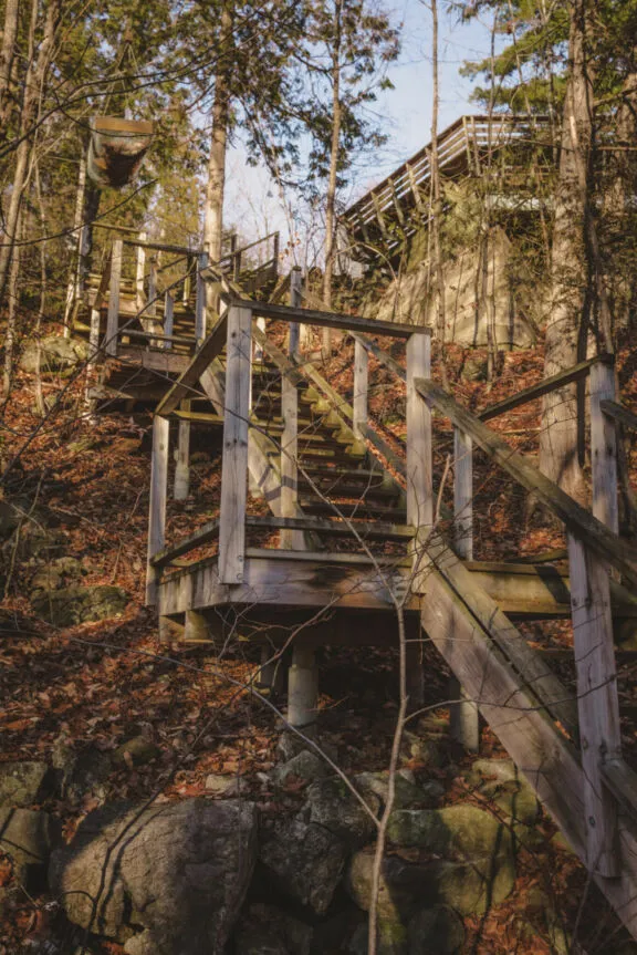 Wooden outdoor staircase with landings.