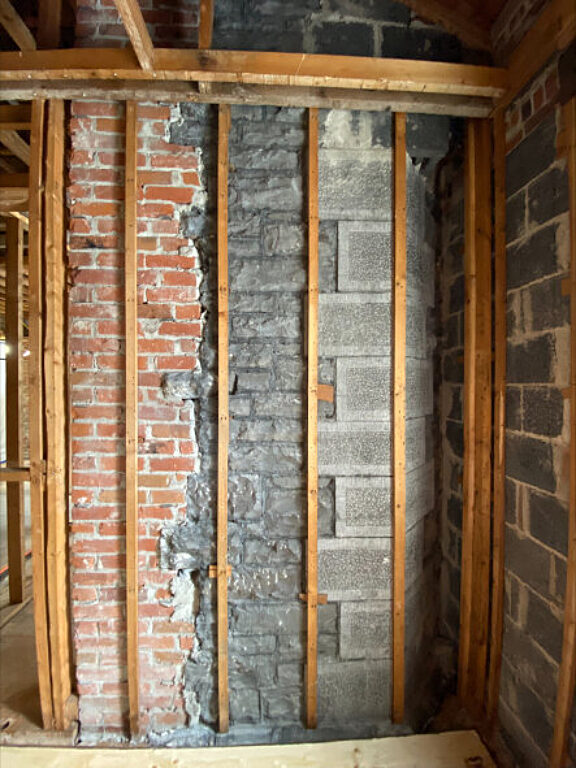 Inside 24 Sussex after abatement of designated substances and removal of obsolete mechanical, heating and electrical systems.